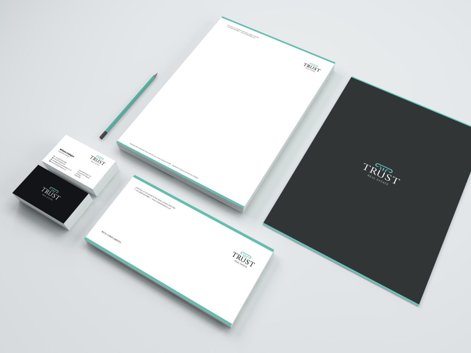 Mock-up of Trust Real Estate's property brand and stationery design.